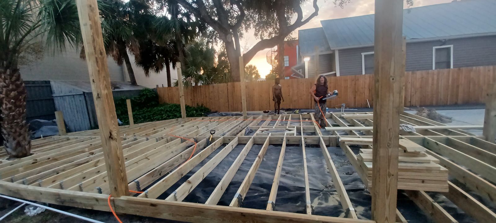 Precision palm cut-out detail in deck joist framing — Piper Outdoors craftsmanship